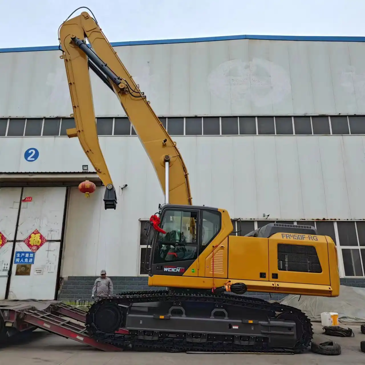 What is an excavator grab arm?